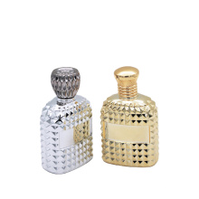 elegant custom golden/argent irregular surface empty glass bottles wholesale